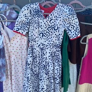 Vintage 50’s Hourglass Mid-length Dress with back cut-out and red lining